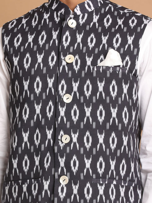 Vastramay Men's Black Ikkat Printed Cotton Nehru Jacket With White Kurta And Pyjama Set